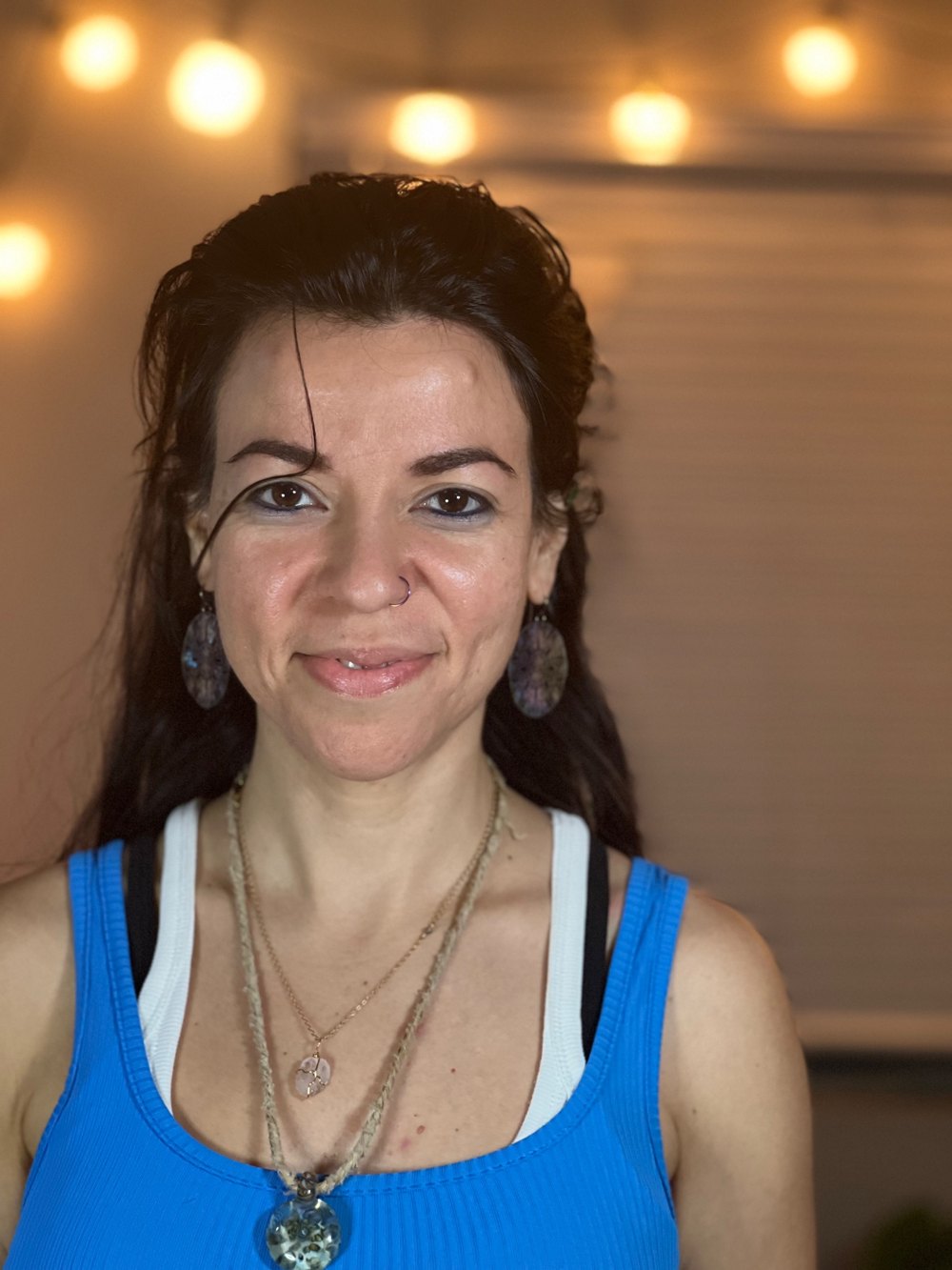 Gabriela Carnicero, smiling, in warm light.